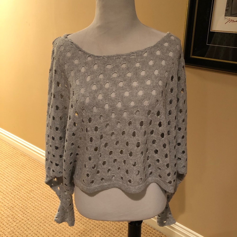 Cute grey sweater w/holes throughout slouched arms